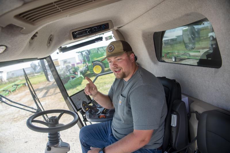 Student sitting in a tractor